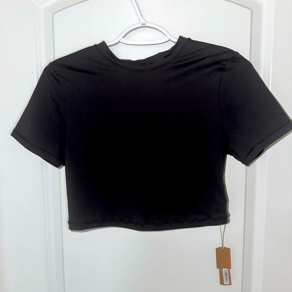 Skims recycles swim Tshirt. Size Lg NWT